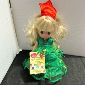 Precious Moments Blonde Doll in Green Dress with Red Headpiece